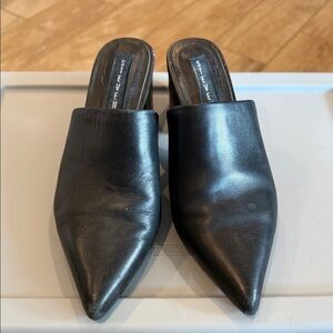 Steve Madden Women's Sleek Black Mules size 7 1/2 with a 2 1/2 inch heel